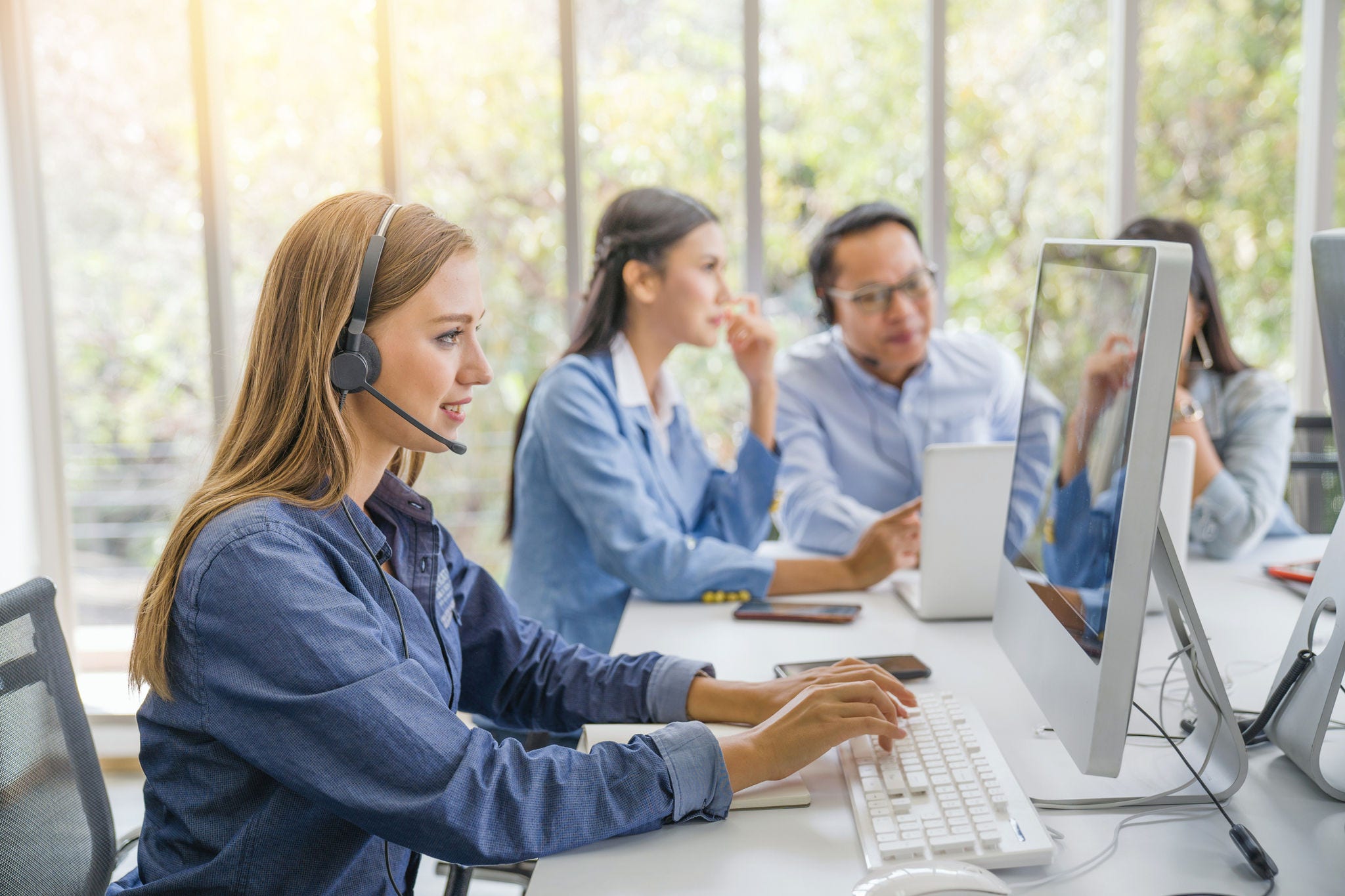 Large group of new online business sale team people and call centre it support helping customer to find a solution for business and advice customer