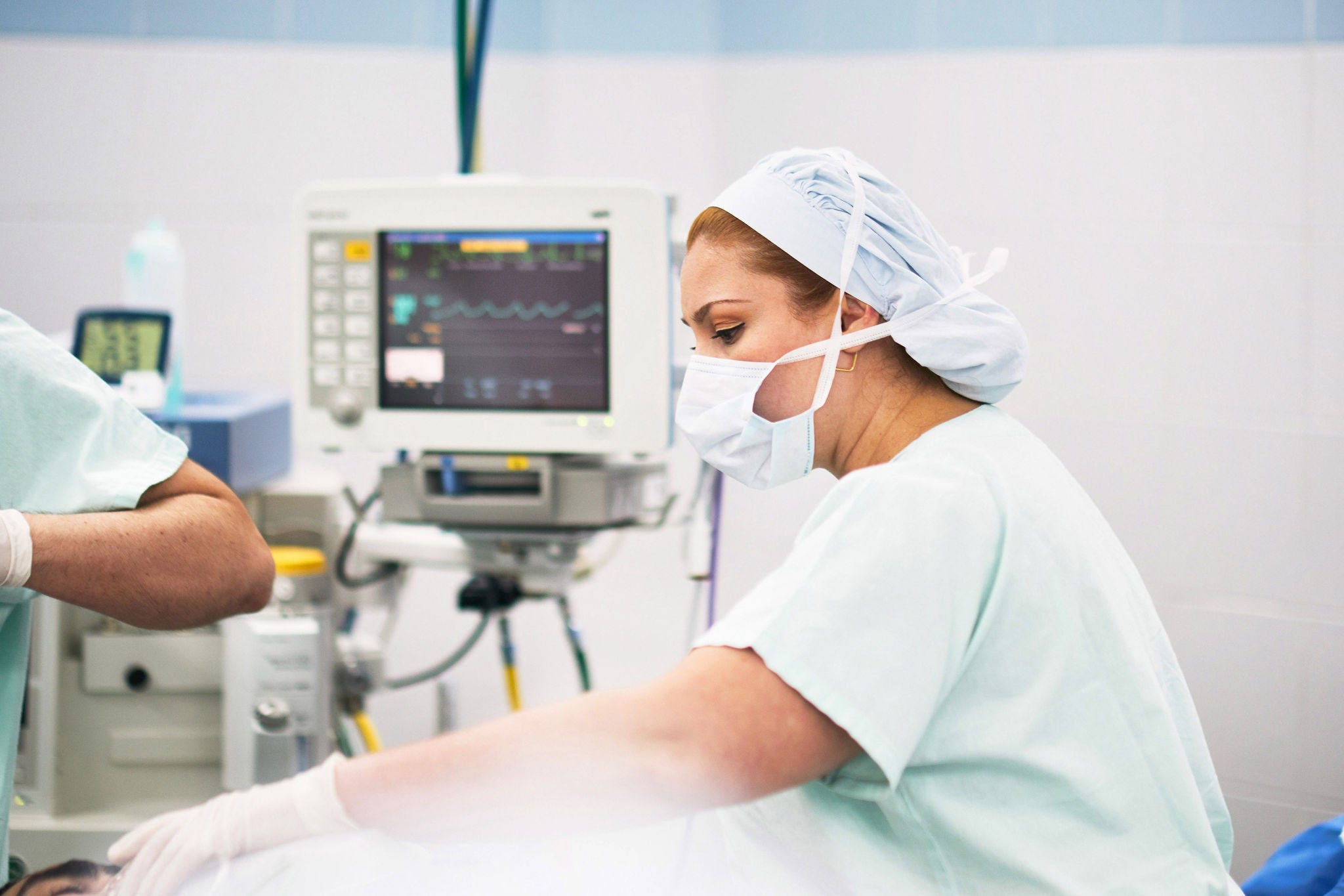 Skilled nurse preparing for an operation