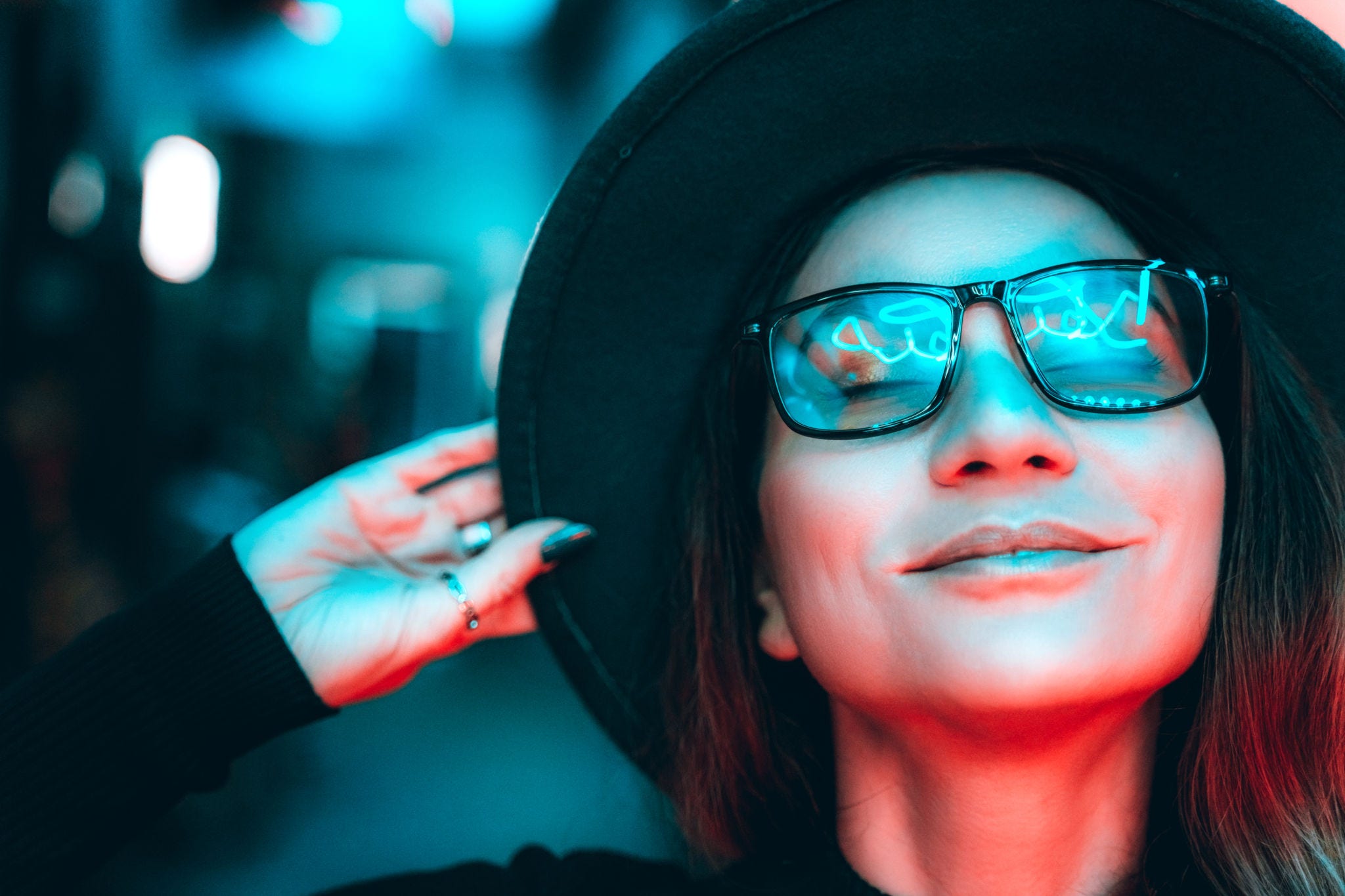 woman wearing hat smiling